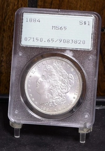 1884 Morgan Dollar - OGH PCGS MS65 (#60794-L)