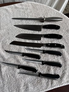 j a henckels knife SET NEVER SHARPENED. 