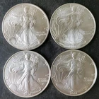 2001, 2003, 2021, and 2021 $1 American Silver Eagle Dollars