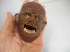 WOLFMAN FACE CAST IRON WALL MOUNTED BOTTLE OPENER