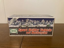2004 HESS SPORT UTILITY VEHICLE AND MOTORCYCLES UNOPENED.