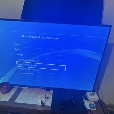 Sony PlayStation 4 Pro Black Console with Controller and Wired Headset