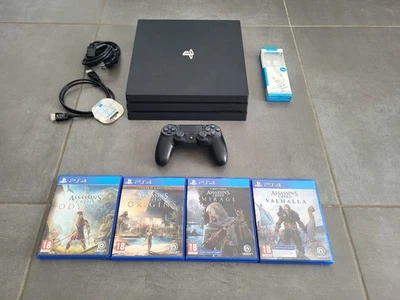 Console PS4 Pro 1 To + 4 jeux - Photo 1/4
