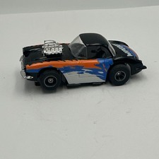 TYCO 60 Corvette Wipeout Slot Car Black Orange Blue Wave Graphic Chrome Engine