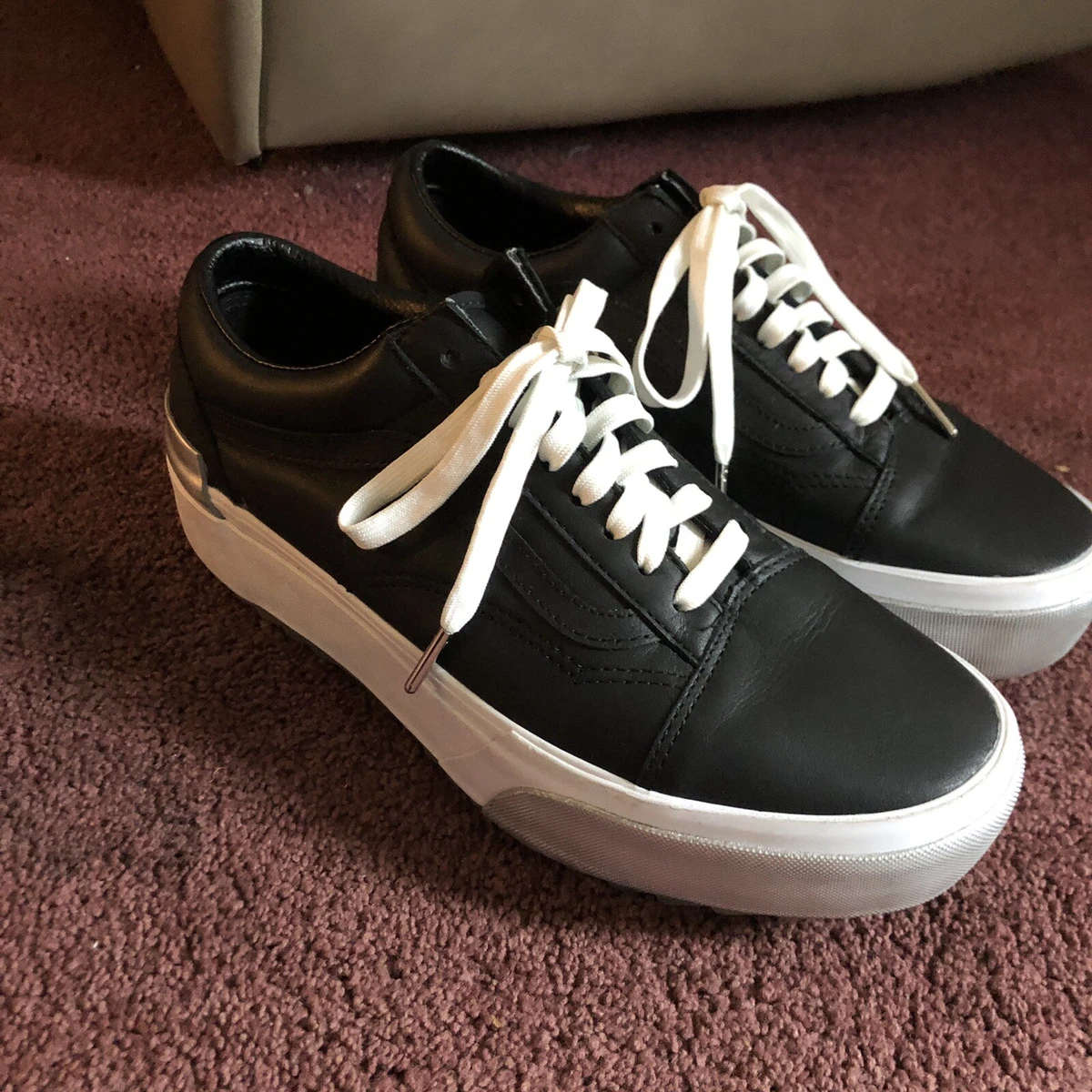 How do you clean black deals vans