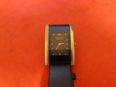 Vintage OMAX Quartz Armbanduhr Watch Movement watch WORKING (315)
