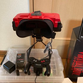 Excellent condition Virtual Boy console + 6 games + AC adapter set.Tested