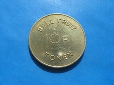 (K) BELL FRUIT (small letters) GOLD COLOURED 10p TOKEN COIN