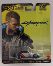HOT WHEELS PREMIUM CYBERPUNK 2077 PORSCHE 911 TURBO (930) REAL RIDERS HXD95