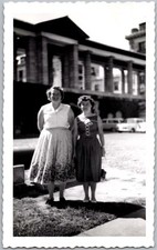 Vtg Snapshot Two Women in Full Skirts Outside Large Building 1950s