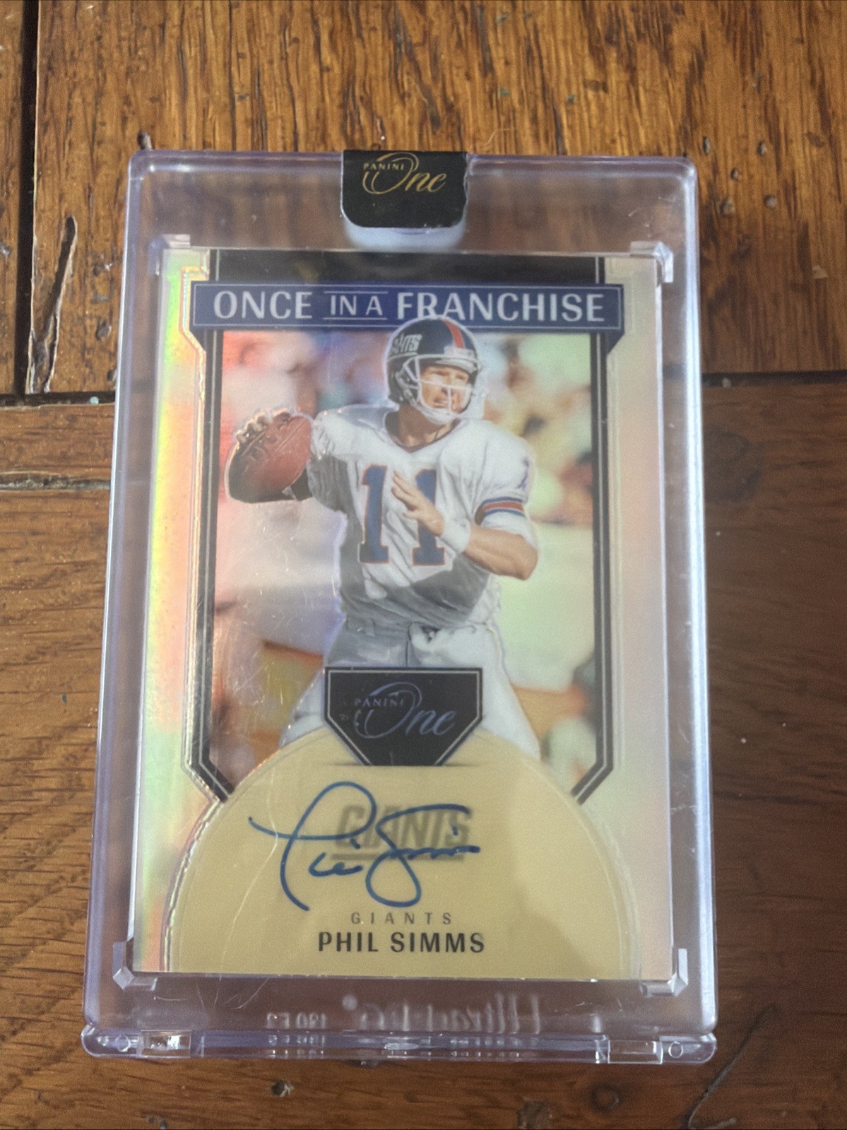 2024 Panini One - Once in a Franchise Autographs Phil Simms #335/99 (AU) Encased