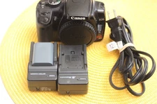 Canon Rebel XTi DSLR Camera with two chargers an bateries