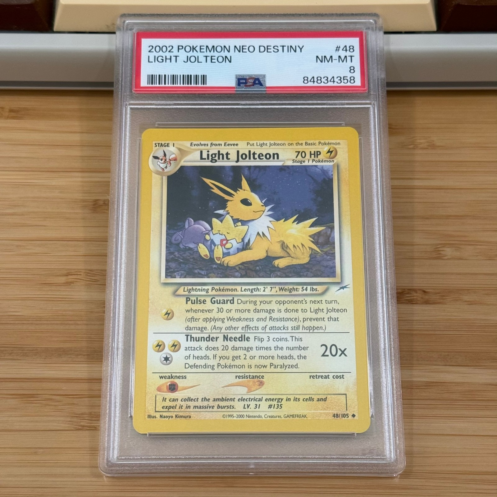 2002 Pokemon Neo Destiny 48 Light Jolteon PSA 8 NM-MT