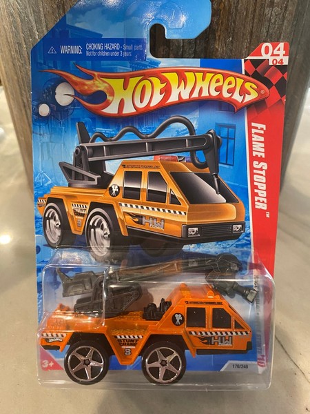 2010 Hot Wheels 174 Race World Movie Stunts Flame Stopper Feuerwehrauto, Orange-image