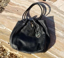 Michael Kors Cinch Top Tassel Black Pebbled Leather Bucket Bag