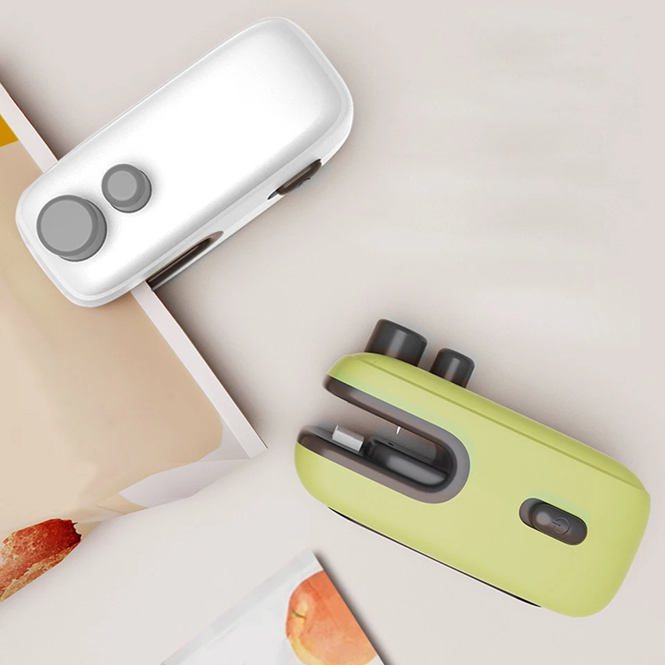 Mini sellador de bolsas, sellador térmico al vacío portátil, sellador térmico y cortador 2 en 1 Foto 2 de 4