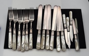 MERIDEN CUTLERY CO. Stamped Sterling Silver. Mother of Pearl handle FLATWARE SET