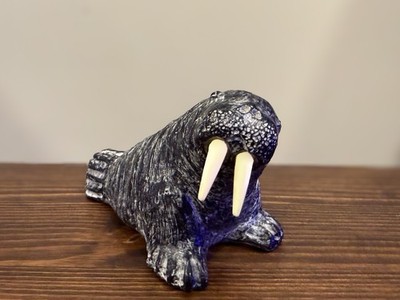 A Wolf Original Walrus hand made from soapstone In Canada