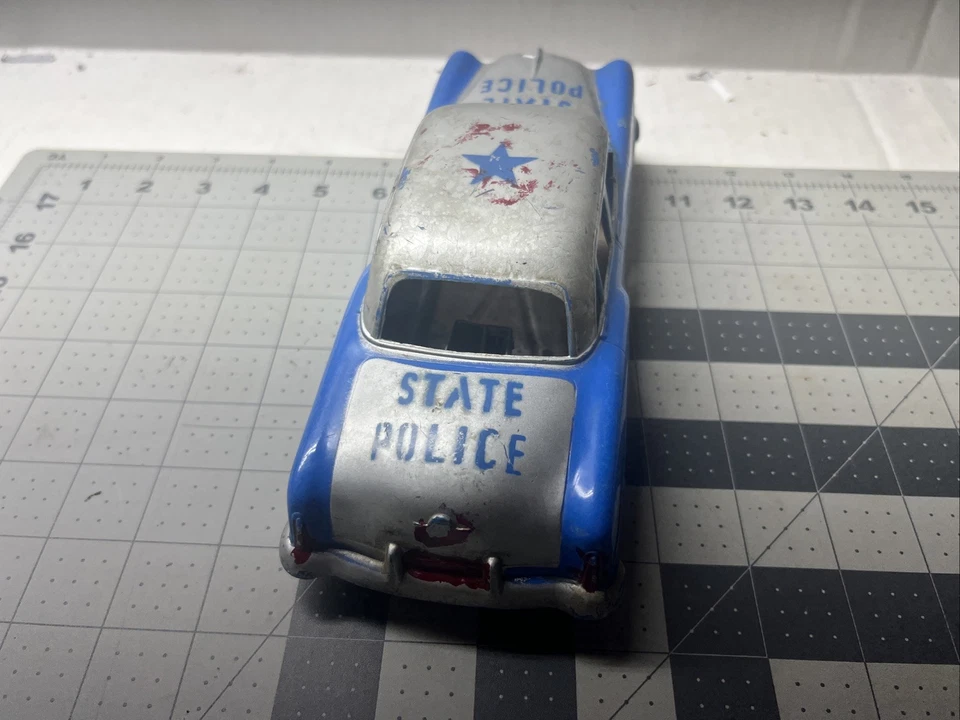 Coche de juguete de fricción vintage Irwin State Police 1953 o 1954 Packard Foto 4 de 4