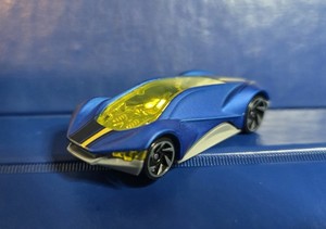 2021 HOT WHEELS EXOTIQUE PURPLE 1:64 DIECAST 2 3/4" CAR W/ YELLOW & BLACK