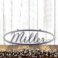Custom Cursive Family Last Name Hanging Oval Metal Sign