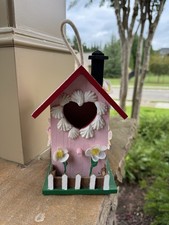 Crafted Colorful Birdhouse With Flowers made From Seashells