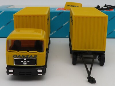 Deux Semi-remorques Porte-engins Herpa : Scania + MAN – Neufs Sous Blister