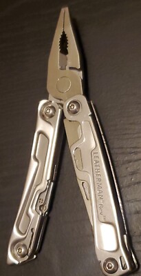 LEATHERMAN REV MULTI-TOOL IS IN MINT CONDITION 024
