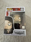 Funko POP! WWE Undertaker #69 Vinyl Figure W/ Protector