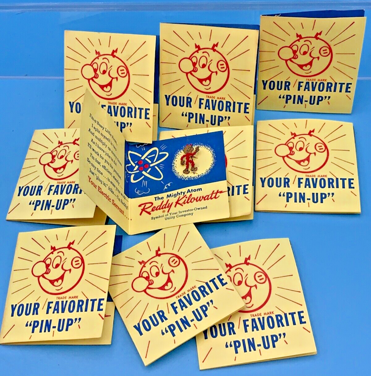 10 PIECES - Vintage 1955 Reddy Kilowatt Mighty Atom Pin Ready