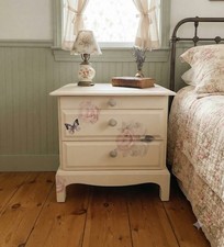 Stag Minstrel  beside cabinet with 2 drawers & pullout tray painted in  cream