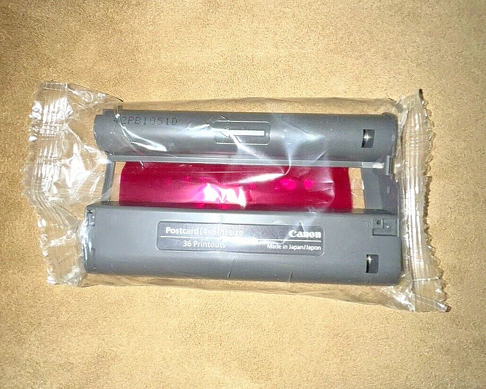 Canon CP-330 Compact Photo Printer with 2 Paper Sets, Trays, Charger & Manual