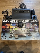 Atari 2600 Console All Paddles Joysticks and Combat Cartridge In Original Box