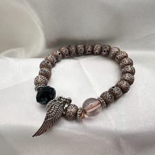 Vintage 80s Spotted Seed Bodhi Bead Bracelet Silver Tone Wing Charm Zen Jewelry