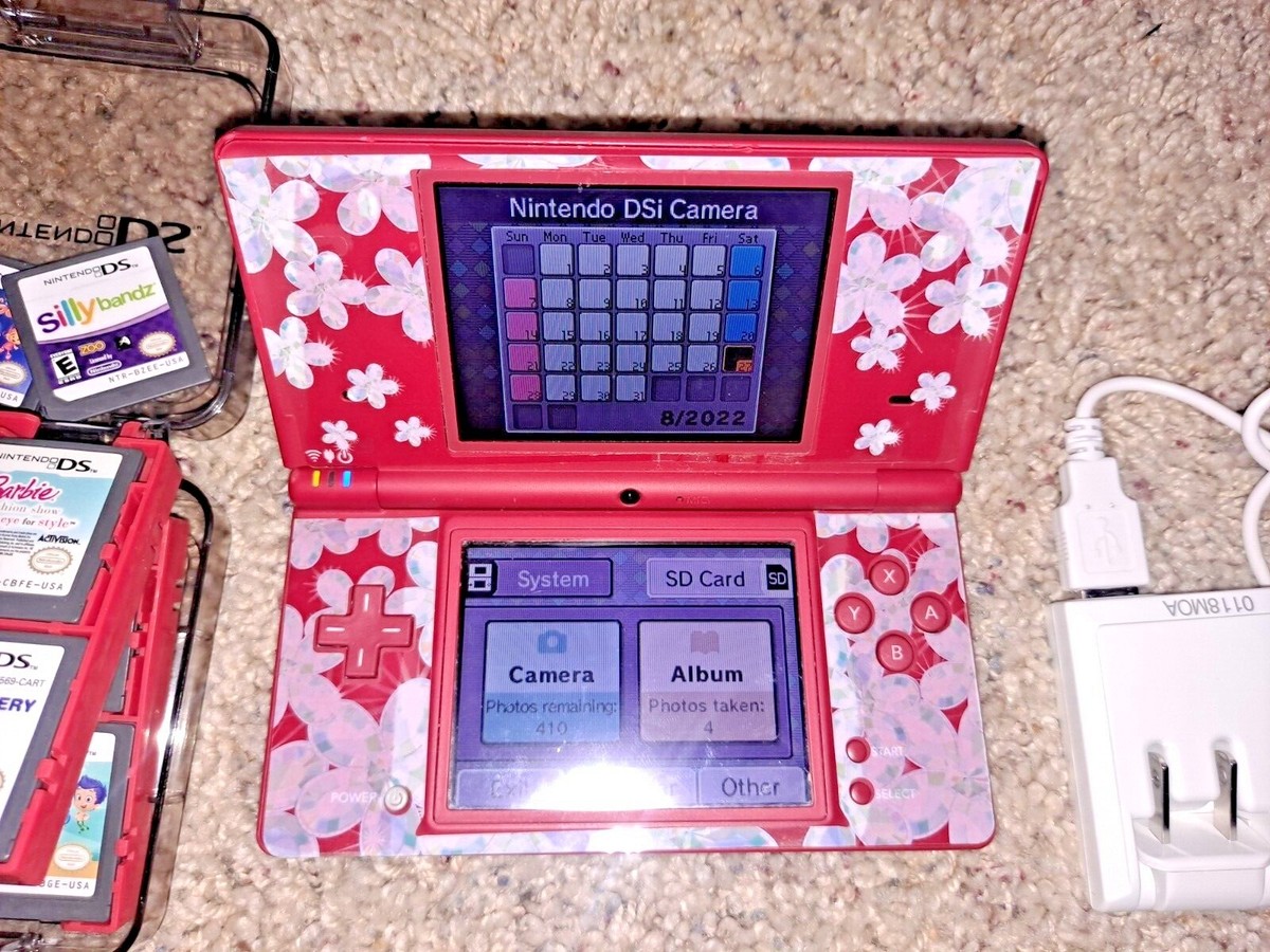 ニンテンドー DSi ケース付き Nintendo DSi Red console system w 18 games in storage case w