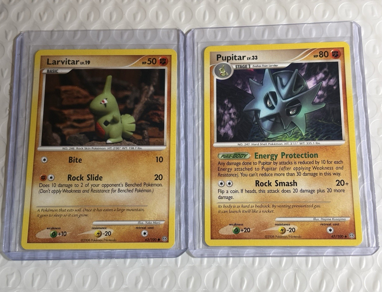 Pokemon TCG - Larvitar 63/100 & Pupitar 47/100 Stormfront Regular Variants - NM-