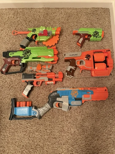 Nerf Zombie Strike Lot – 6 Blasters + Scope Attachment + Bullets – Read Desc
