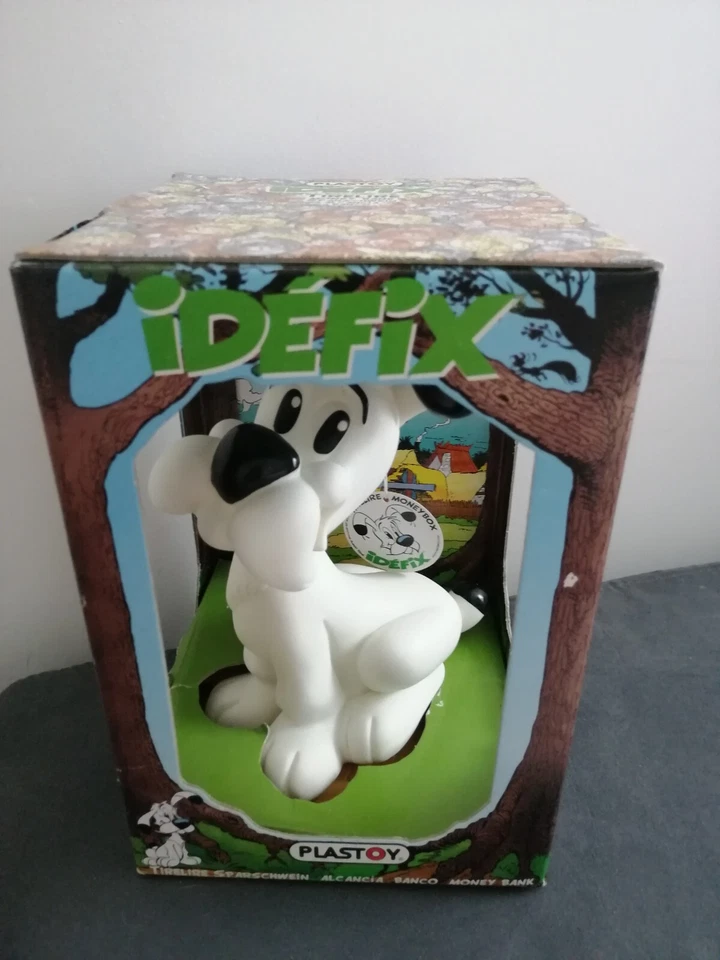 Tirelire . IDEFIX . Plastoy . Dans sa boîte d 'origine un peu abîmée . - Photo 1/4