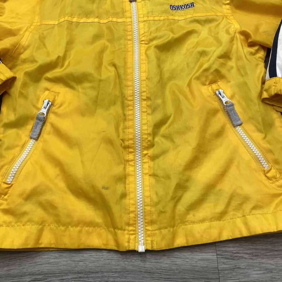 Chaqueta cortavientos OSHKOSH con capucha amarilla con cremallera completa con forro para niño mediana 5/6 Foto 4 de 4