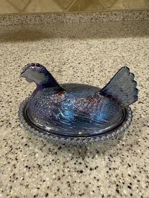 iridescent, metallic finish blue glass chicken on nest