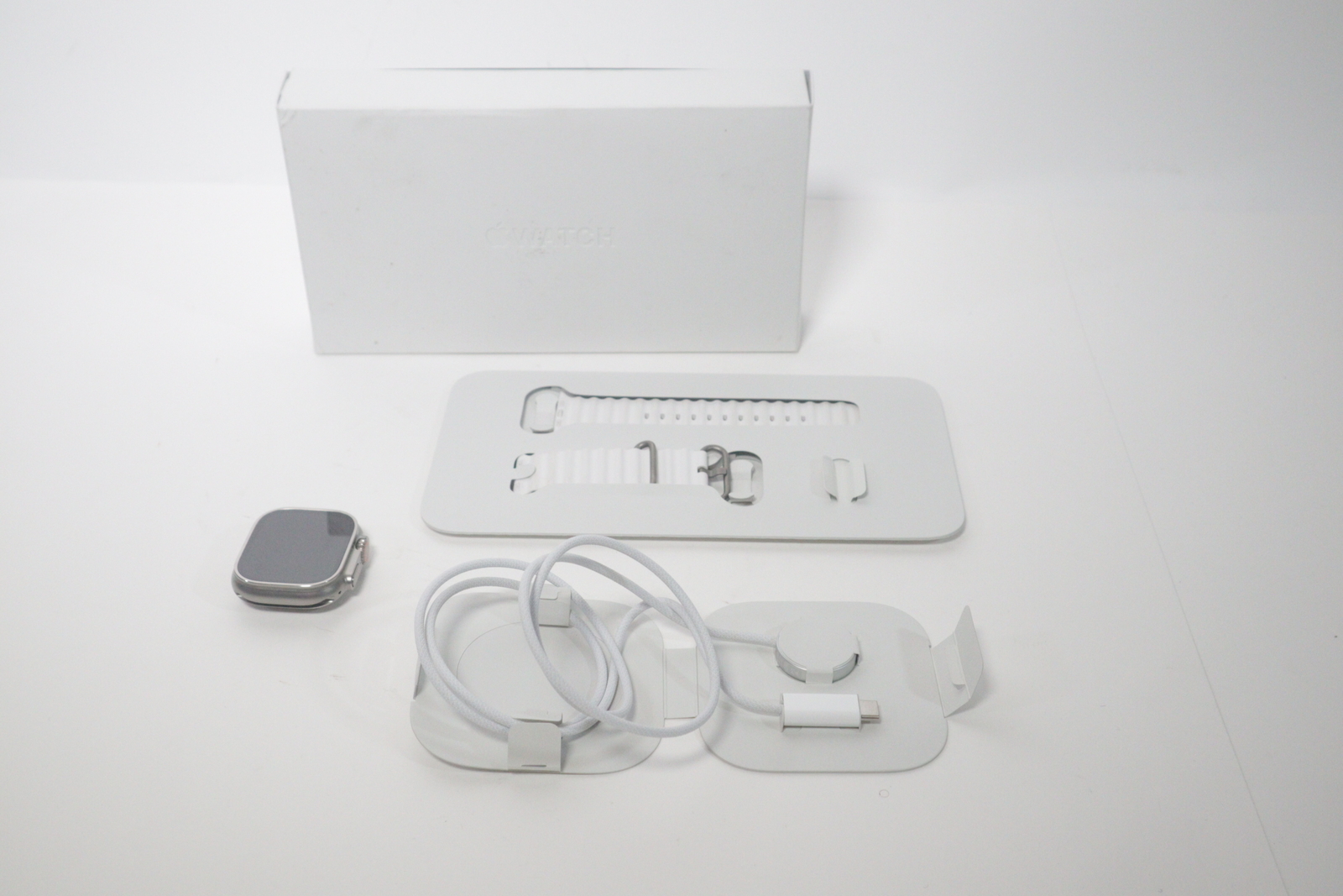 Apple Watch Ultra 2 MREG3LW/A Silver 49mm Titanium Smartwatch 1708 / White Band-image