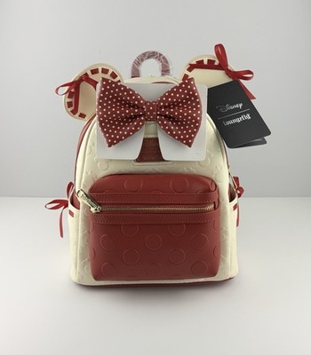 disney loungefly minnie mouse red mini backpack Exclusive Glitter Tonal | Officially Licensed | Plastic/Vegan Leather The glitter details also repeat on the side pockets Loungefly Mickey, Minnie and Pluto
