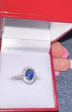 Oval Blue Sapphire Halo Ring with Diamond Acc...
