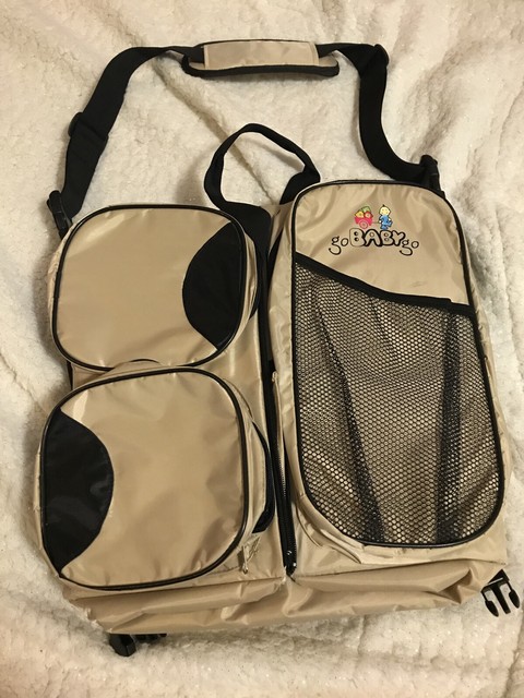 diaper bag tote with multiple separate pockets and changing pad