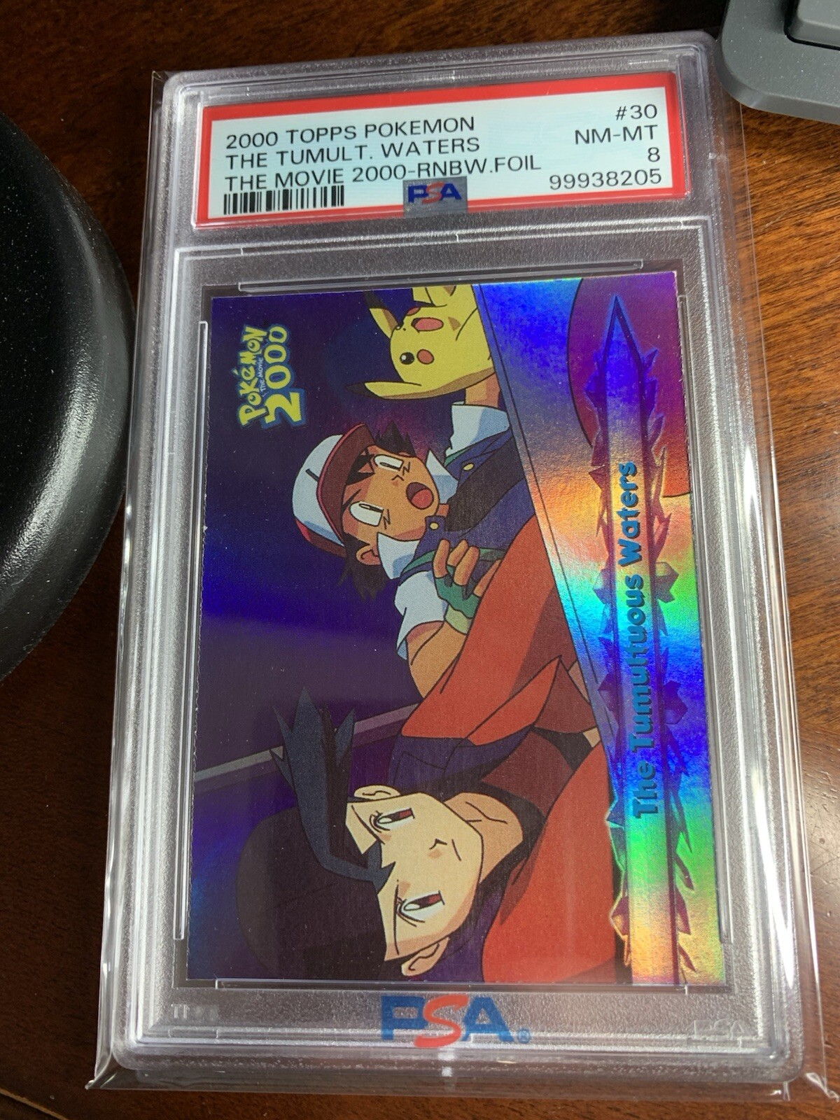 Topps Pokemon the Movie 2000 #30 Tumultuous Waters RAINBOW FOIL PSA 8 NM-MT