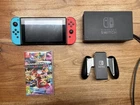 Nintendo Switch Neon Blue and Neon Red Handheld Console with Mario Kart Deluxe 8