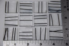 4100.00 - 12 - BLACK STREAMERS ON 3mm CLEAR 1" x 1" BULLSEYE GLASS 90 COE