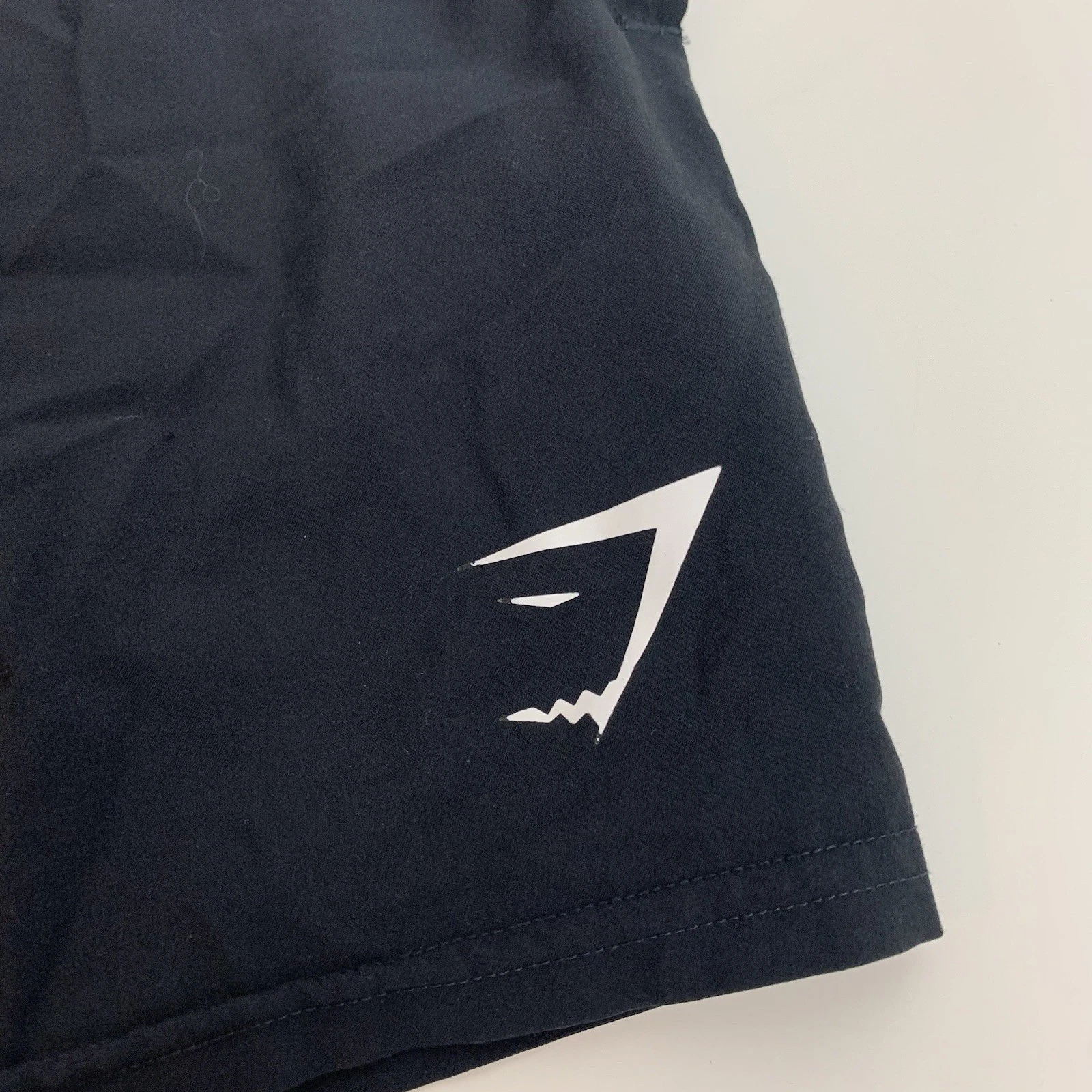 gymshark training loose fit crest logo pre owned shorts