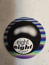 POG - 8 ball, black with black/purple/pink/yellow boarder.