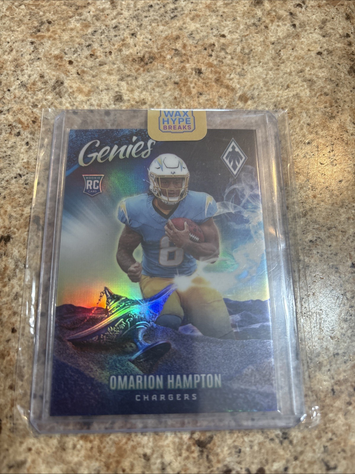 2025 Panini Phoenix Omarion Hampton #16 Genies SSP Case Hit (RC) Chargers